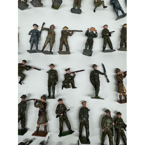 313 - Large quantity of Britains Hollow Cast WW1 & WW2 Infantry, Officers , accesories