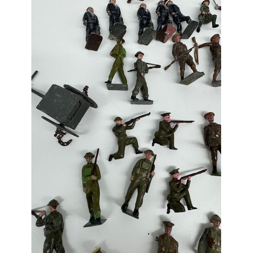 313 - Large quantity of Britains Hollow Cast WW1 & WW2 Infantry, Officers , accesories