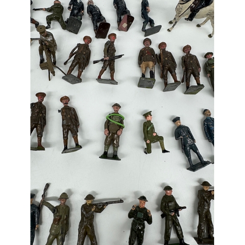 313 - Large quantity of Britains Hollow Cast WW1 & WW2 Infantry, Officers , accesories