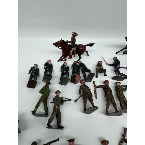 313 - Large quantity of Britains Hollow Cast WW1 & WW2 Infantry, Officers , accesories