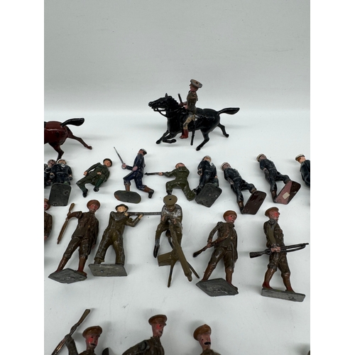 313 - Large quantity of Britains Hollow Cast WW1 & WW2 Infantry, Officers , accesories