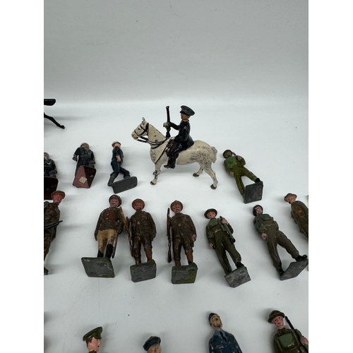 313 - Large quantity of Britains Hollow Cast WW1 & WW2 Infantry, Officers , accesories