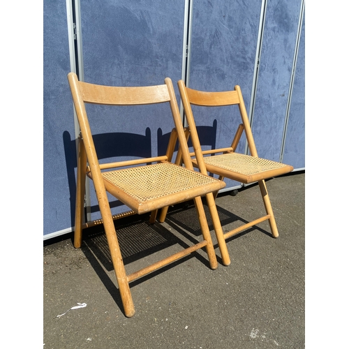 423 - Two retro fold out chairs.