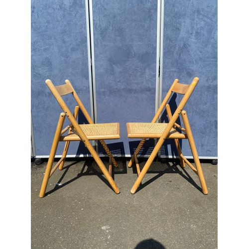 423 - Two retro fold out chairs.