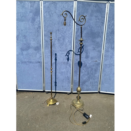 188 - Two brass floor lamps