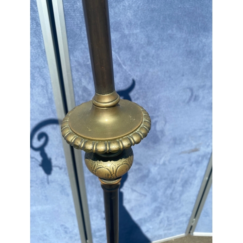 188 - Two brass floor lamps