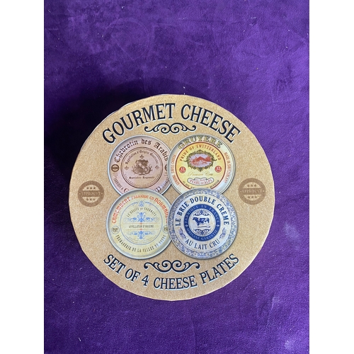 232 - Seven Franklin mint collectable plates and a set of four gourmet cheese plates.