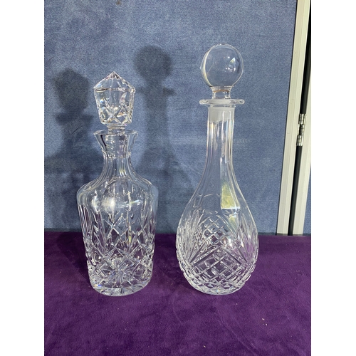 233 - Two crystal decanters.