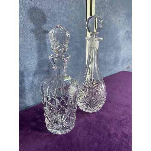 233 - Two crystal decanters.