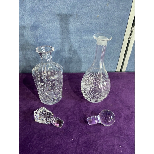 233 - Two crystal decanters.