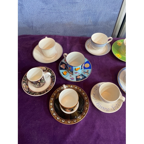 248 - A quantity of collectable cups and saucers including Gucci, Villeroy & Boch