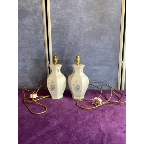 251 - A pair of ceramic table lamps.