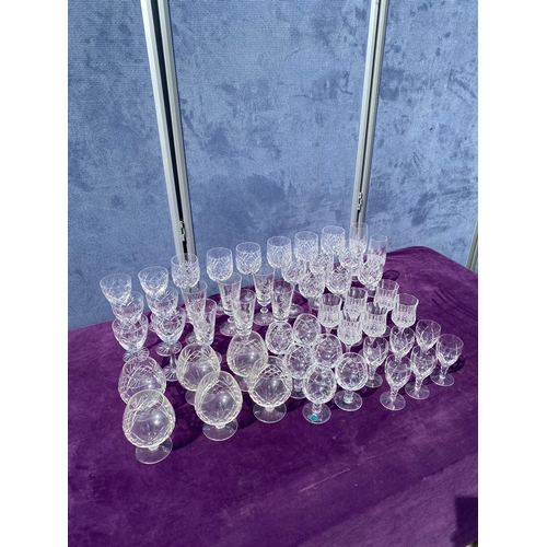 81 - A collection of crystal wine glasses.