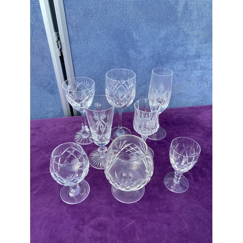 81 - A collection of crystal wine glasses.