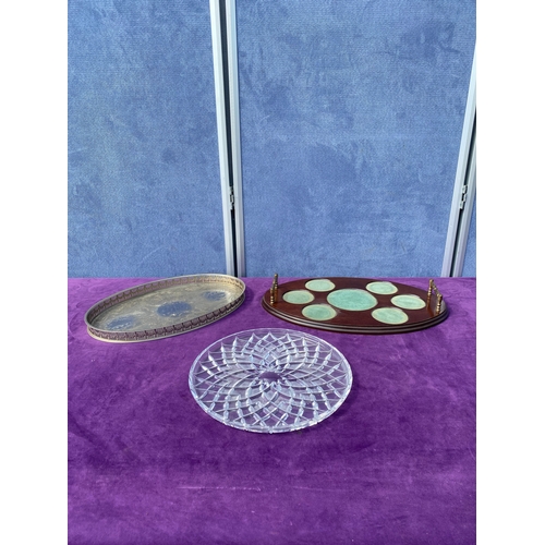 82 - Three serving trays including silver plate.