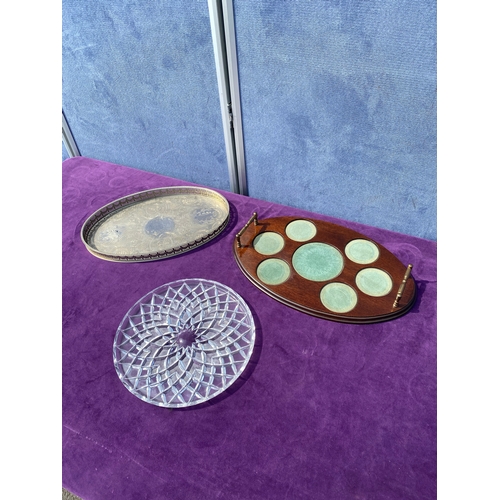 82 - Three serving trays including silver plate.