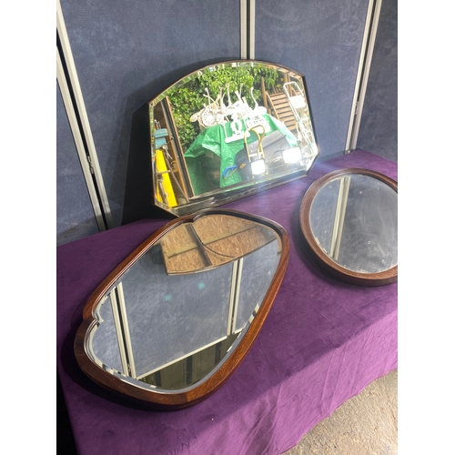 429 - Three bevelled edge wooden framed mirrors.