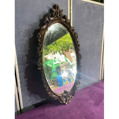 430 - Ornate wooden framed oval mirror

Dimensions - 40