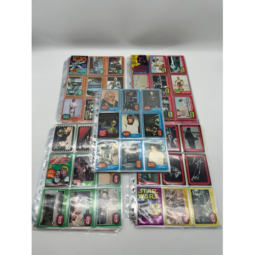 568 - Complete Topps Star Wars Series 1 - 5 Collectable cards complete with stickers and resealed wax pack... 