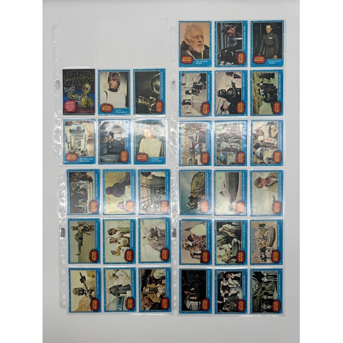 568 - Complete Topps Star Wars Series 1 - 5 Collectable cards complete with stickers and resealed wax pack... 