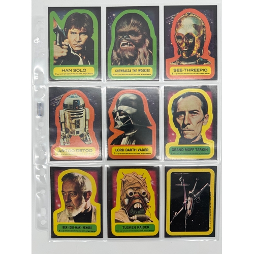 568 - Complete Topps Star Wars Series 1 - 5 Collectable cards complete with stickers and resealed wax pack... 