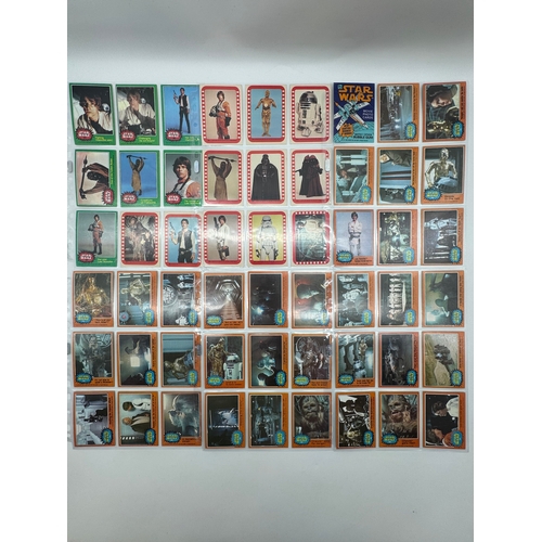 568 - Complete Topps Star Wars Series 1 - 5 Collectable cards complete with stickers and resealed wax pack... 