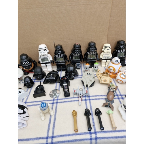 586 - Large lot of star wars collectables including PEZ and large lego figures