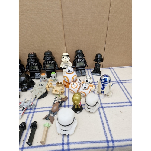 586 - Large lot of star wars collectables including PEZ and large lego figures