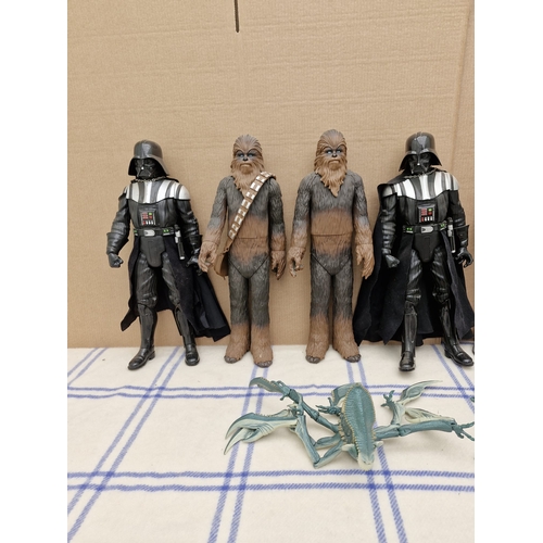 593 - Collection of larger star wars figurines.