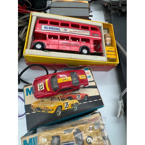 248 - Tri-ang Minic Motorway Motorised Track, race cars, bus + accessories, some in original cartons