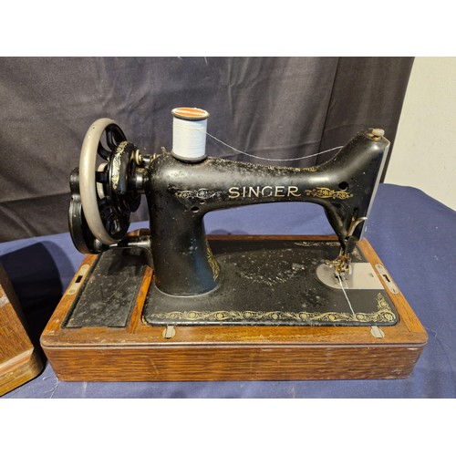 452 - Two Vintage singer sewing machines