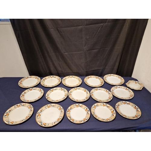 455 - A collection of Gillson ware ceramic plates and lids.