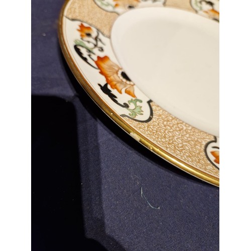 455 - A collection of Gillson ware ceramic plates and lids.