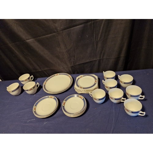 461 - Matching ceramic set with cups and saucers.