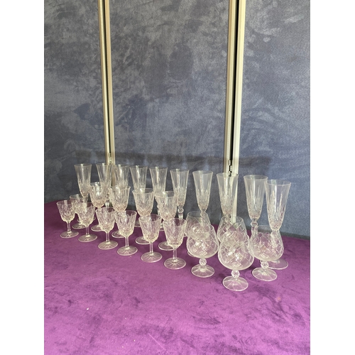 463 - A collection of crystal wine, sherry and champagne glasses.