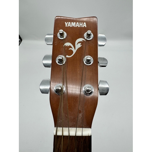 29 - Yamaha F310 Acoustic Guitar