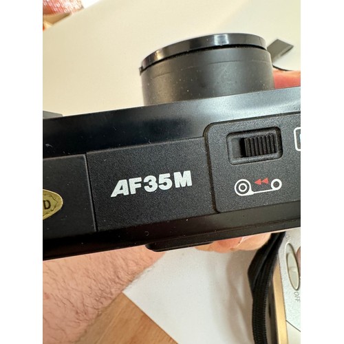 53 - Four Canon Cameras - BF10, Sure Shot EX, AF35M