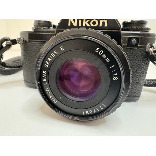 62 - Nikon EM 35mm Camera with Nikon Series E f1.8 50mm lens includes Nikon Series 35mm f/2.5 lens, SB-E ... 