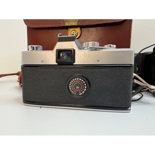 64 - Minolta SR T 101 35mm Camera with f/1.7 50mm lens, flashes plus filters in leather case