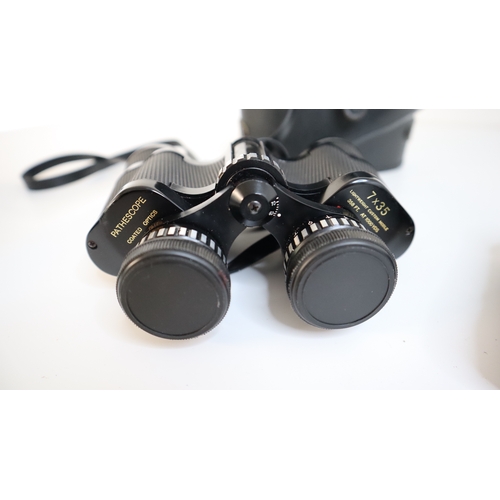 83 - Three sets of Binoculars - Pathescope 7 x 35, Opticron Classic 7 x 42, Praktica 10 x 25