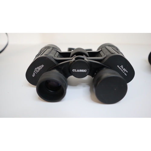 83 - Three sets of Binoculars - Pathescope 7 x 35, Opticron Classic 7 x 42, Praktica 10 x 25