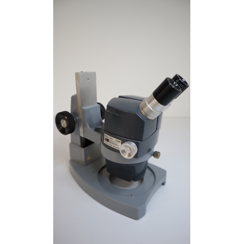 87 - American Optical AO 570 Stereo Star 0.7x to 4.2x Microscope