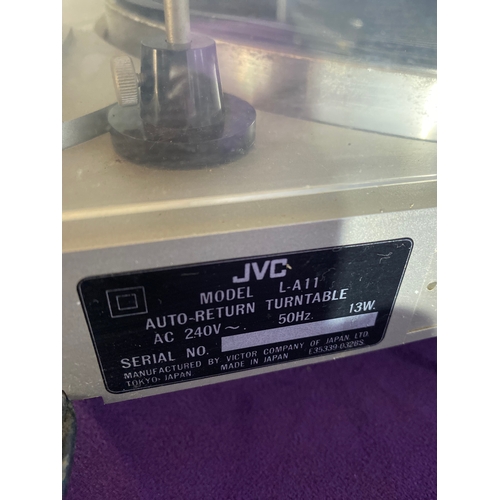 148 - A JVC model L-A11 auto return turntable and a Aiwa PX-E850K Stereo turntable system