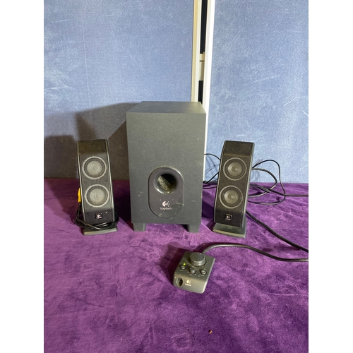 154 - Logitech X-540 sound system.