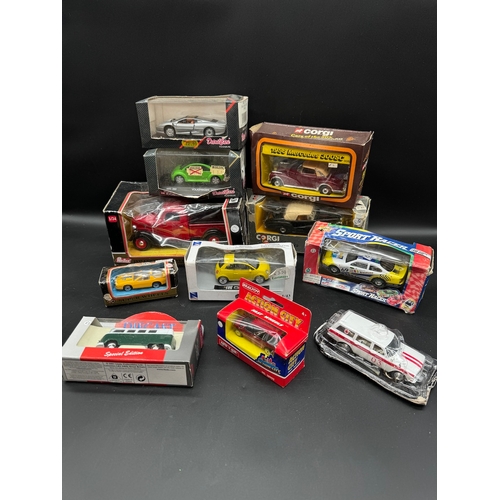 129 - A collection of Corgi + other diecast model cars / vehicles all boxed