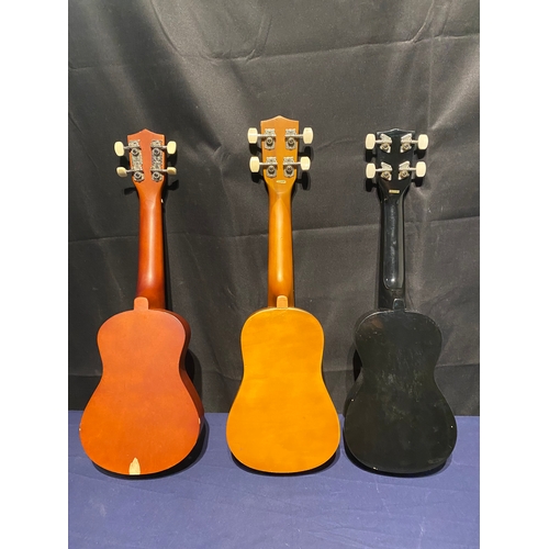 224 - Three Ukuleles including Vintage, Malani and C.Giant.