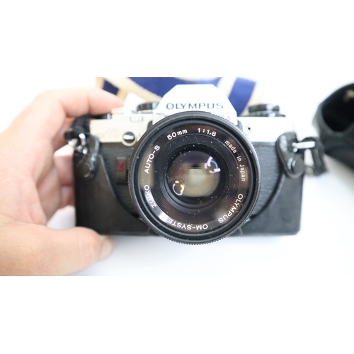 230 - Olympus OM10 SLR Camera w/ 50mm f1.8 lens