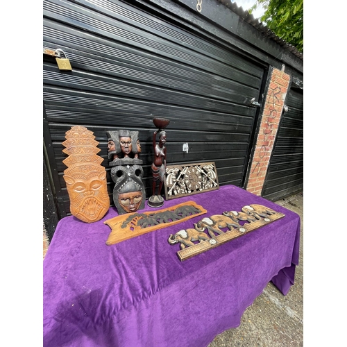 74 - African inspired carved wooden ornaments.