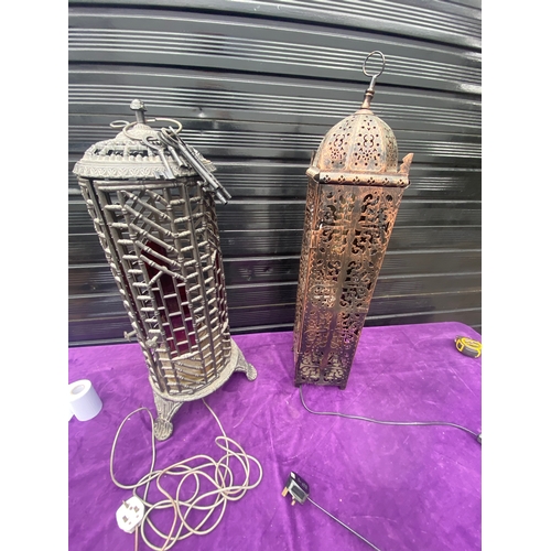 89 - Three metal caged Lamps