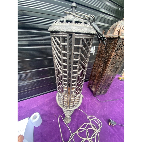 89 - Three metal caged Lamps